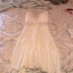 Beautiful white dress faded rose I wanted it to fit me but it just didn’t